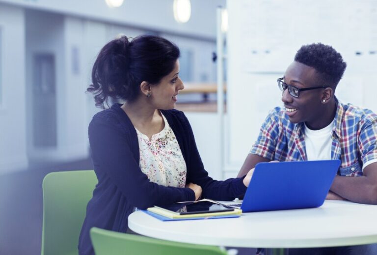 academic mentor guiding a high achieving student during a mentorship session